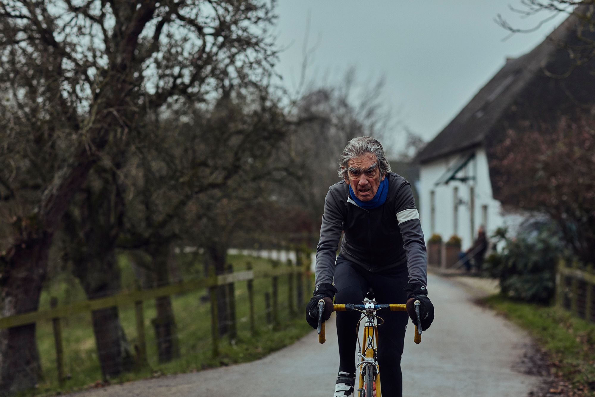 Albert riding towards the camera on a country lane
