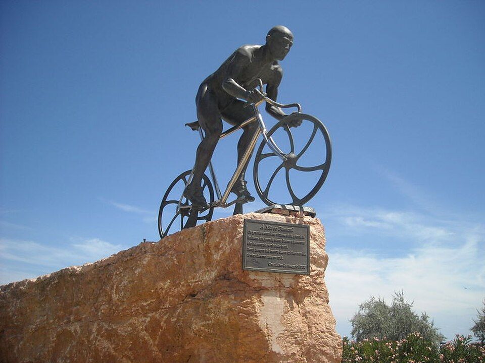 Bronze statue of Marco Pantani on a racing bicycle in Cesenatico