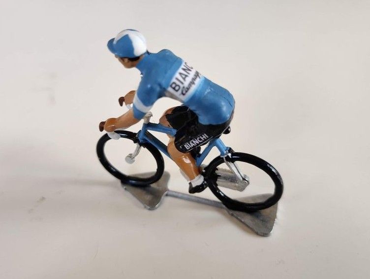 Later miniature cyclist in a Bianchi jersey