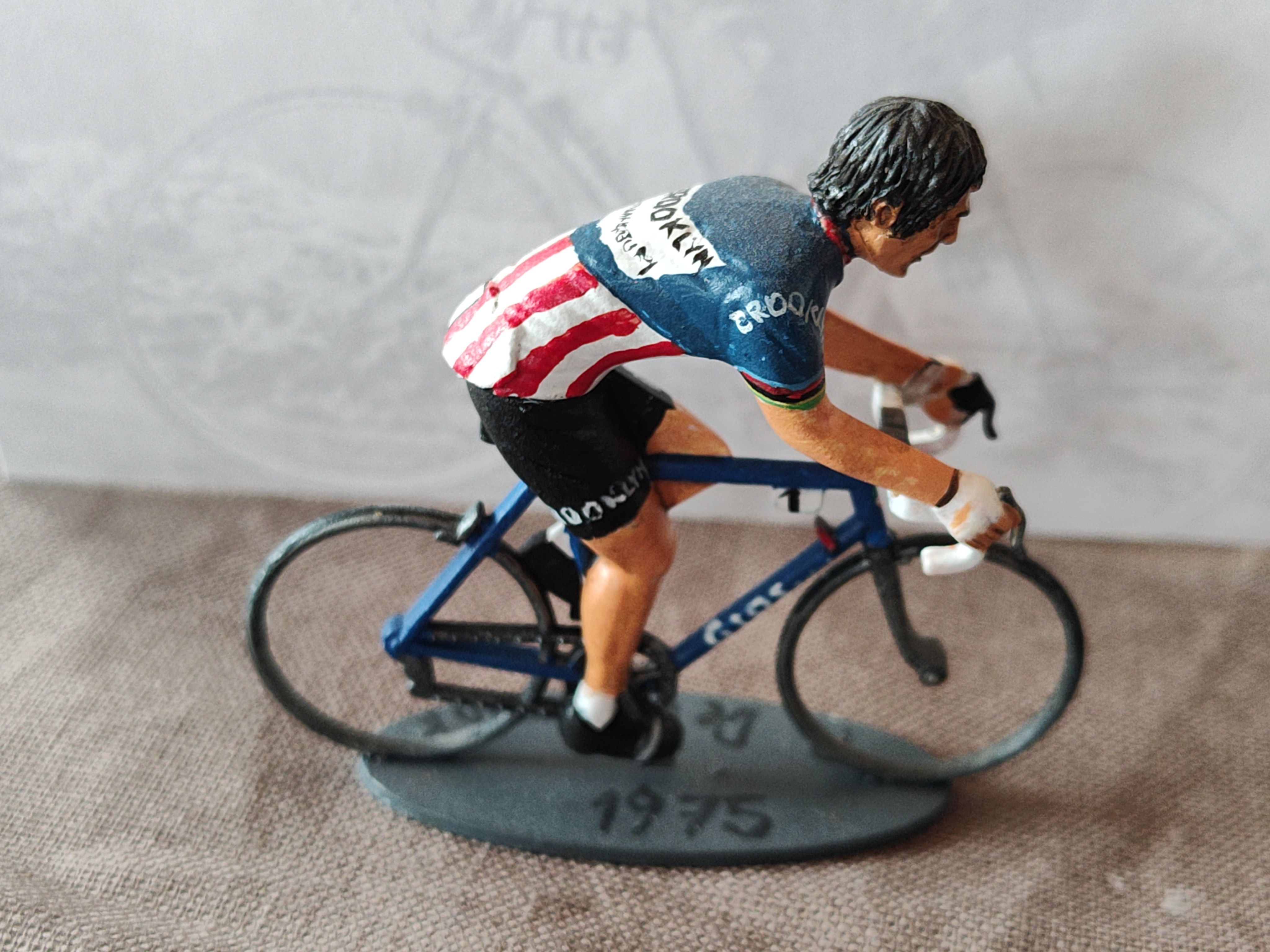 Hand-decorated Brooklyn miniature cyclist with 1973 on its base