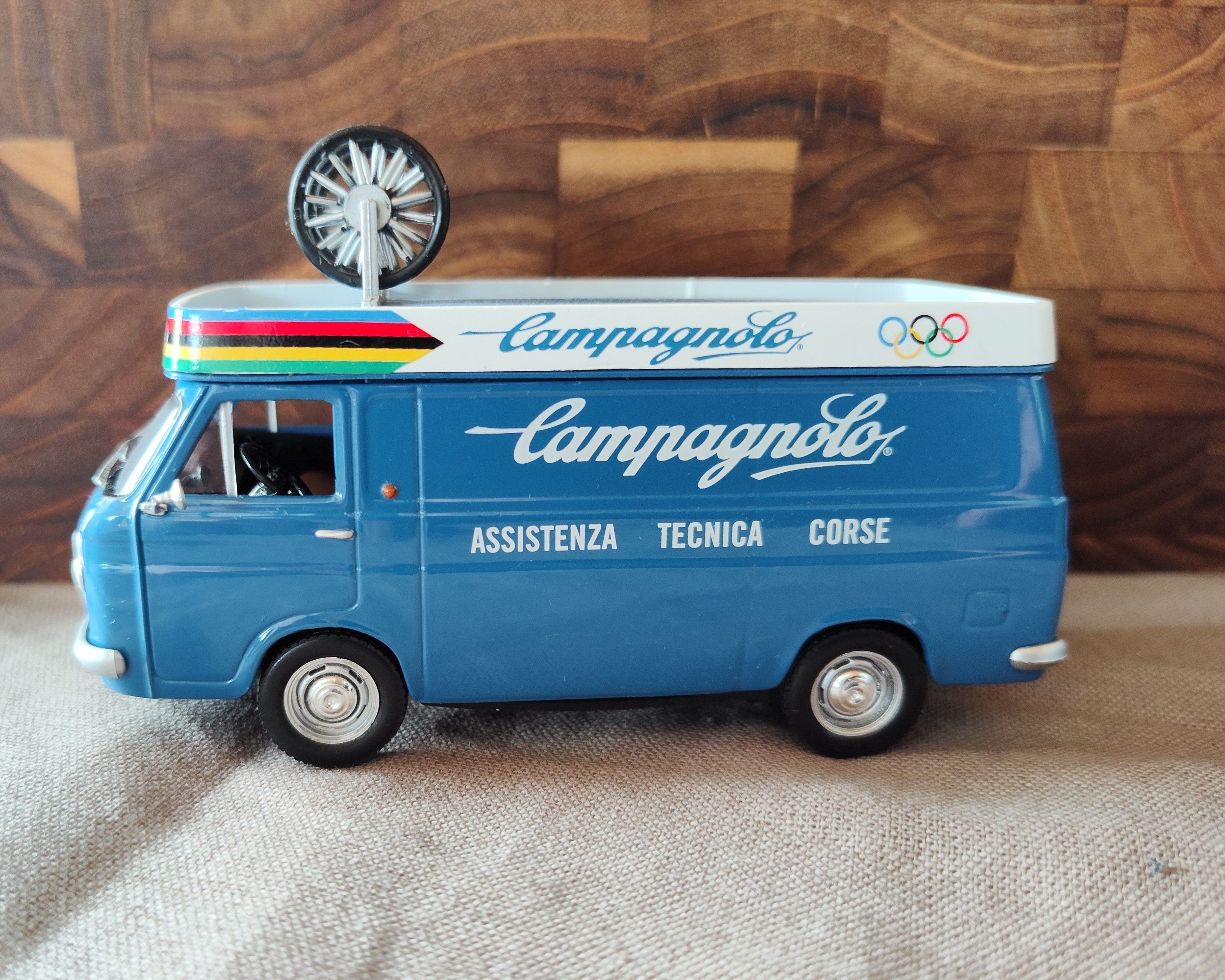 Blue Campagnolo miniature van with a spare wheel on its roof