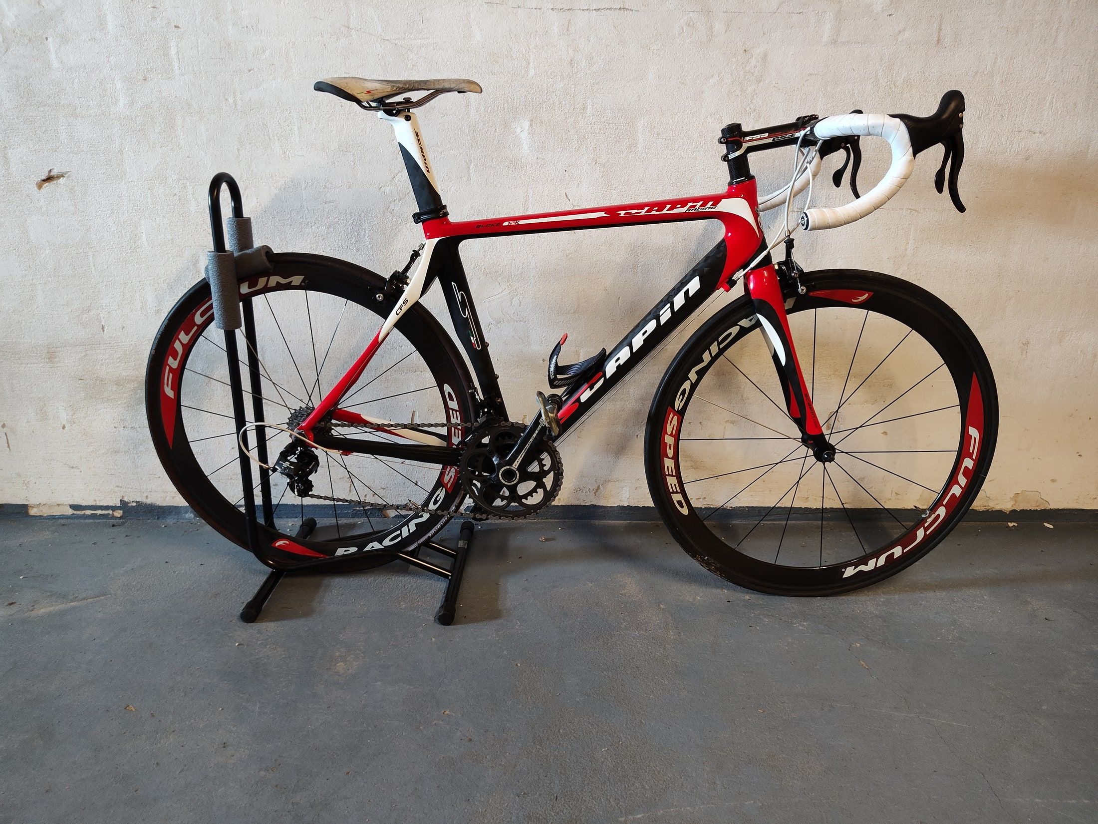Red, black and white 2013 Scapin K6 seen from the drive side
