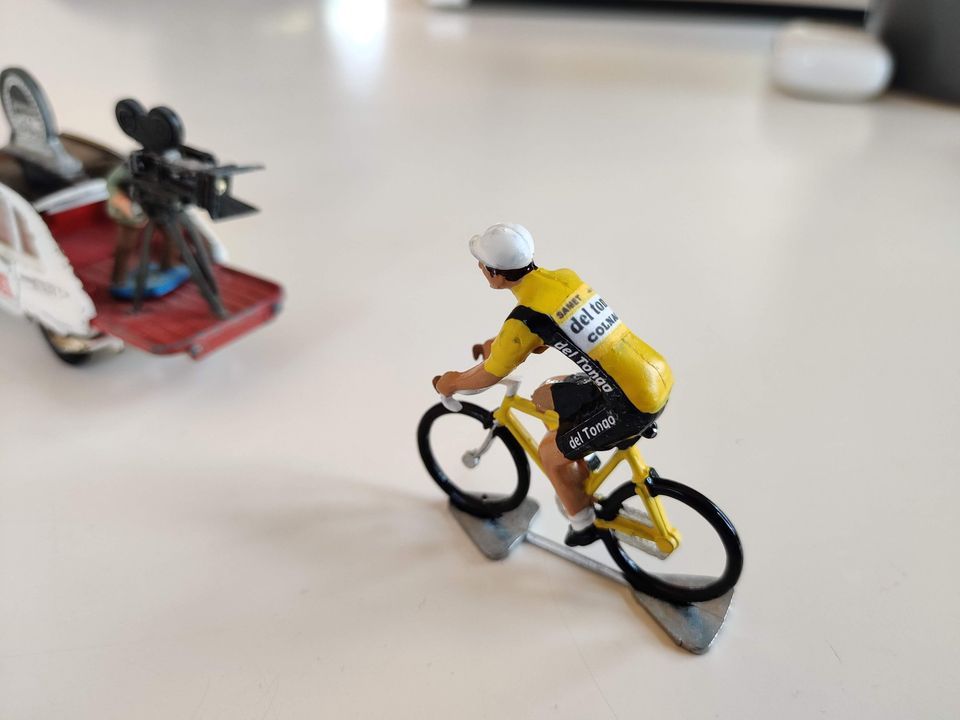Miniature Del Tongo cyclist in a yellow jersey