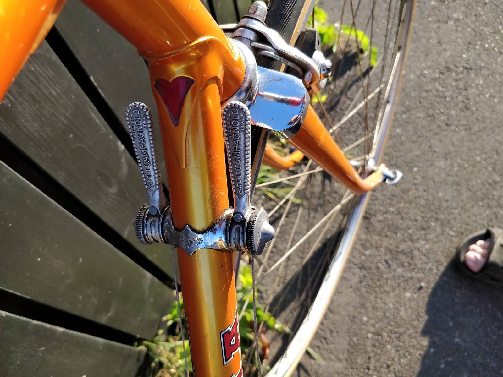 Campagnolo friction levers on the orange Olympia down tube
