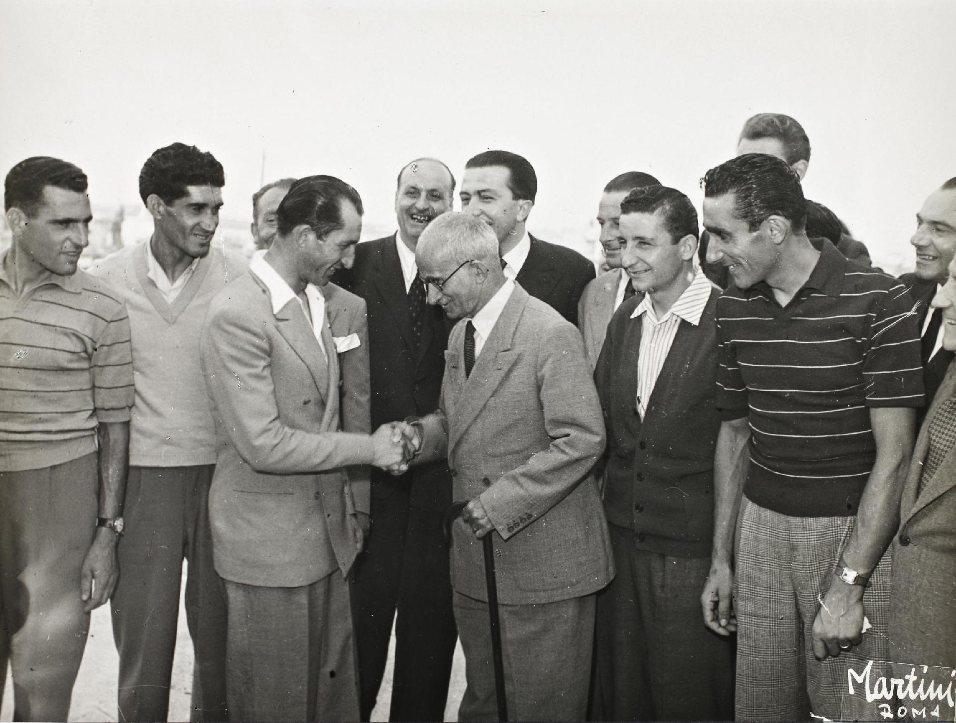 Italian president Luigi Einaudi greets Gino Bartali after his 1948 Tour victory