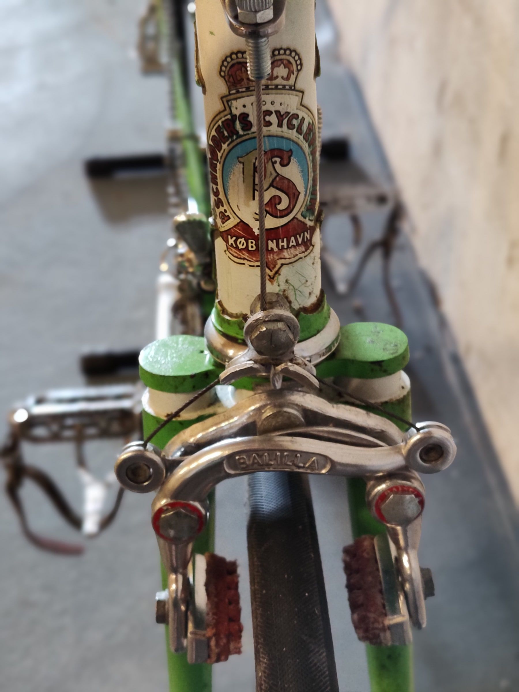 Worn Copenhagen Schrøder head badge above the Balilla front brake