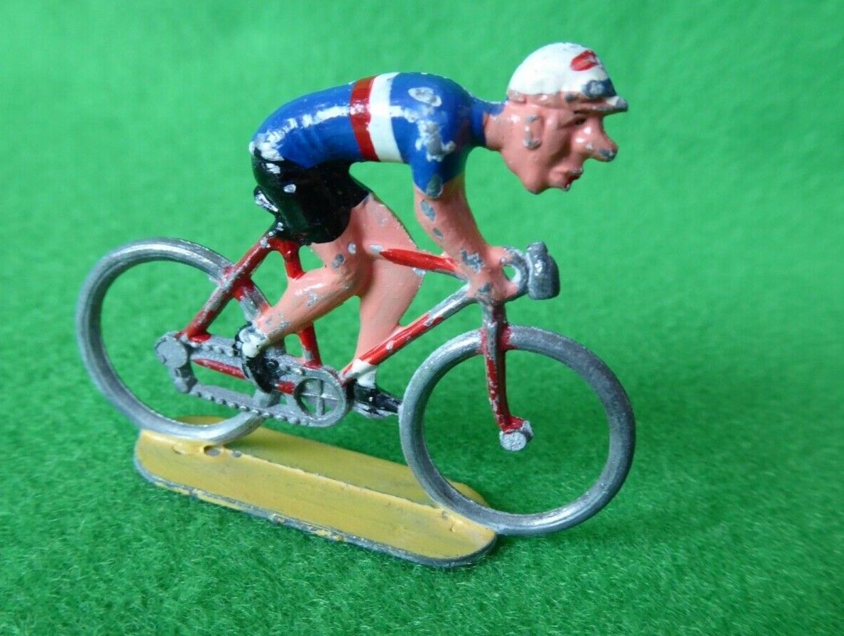 Older miniature cyclist with a notably long nose