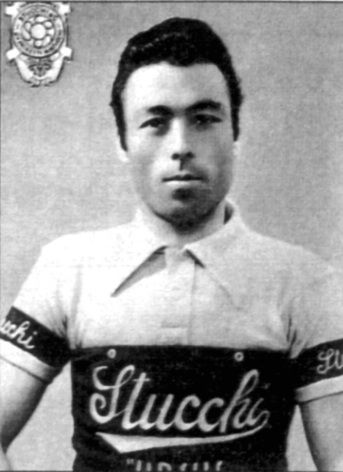 Luigi Malabrocca photographed in a dark cycling jersey