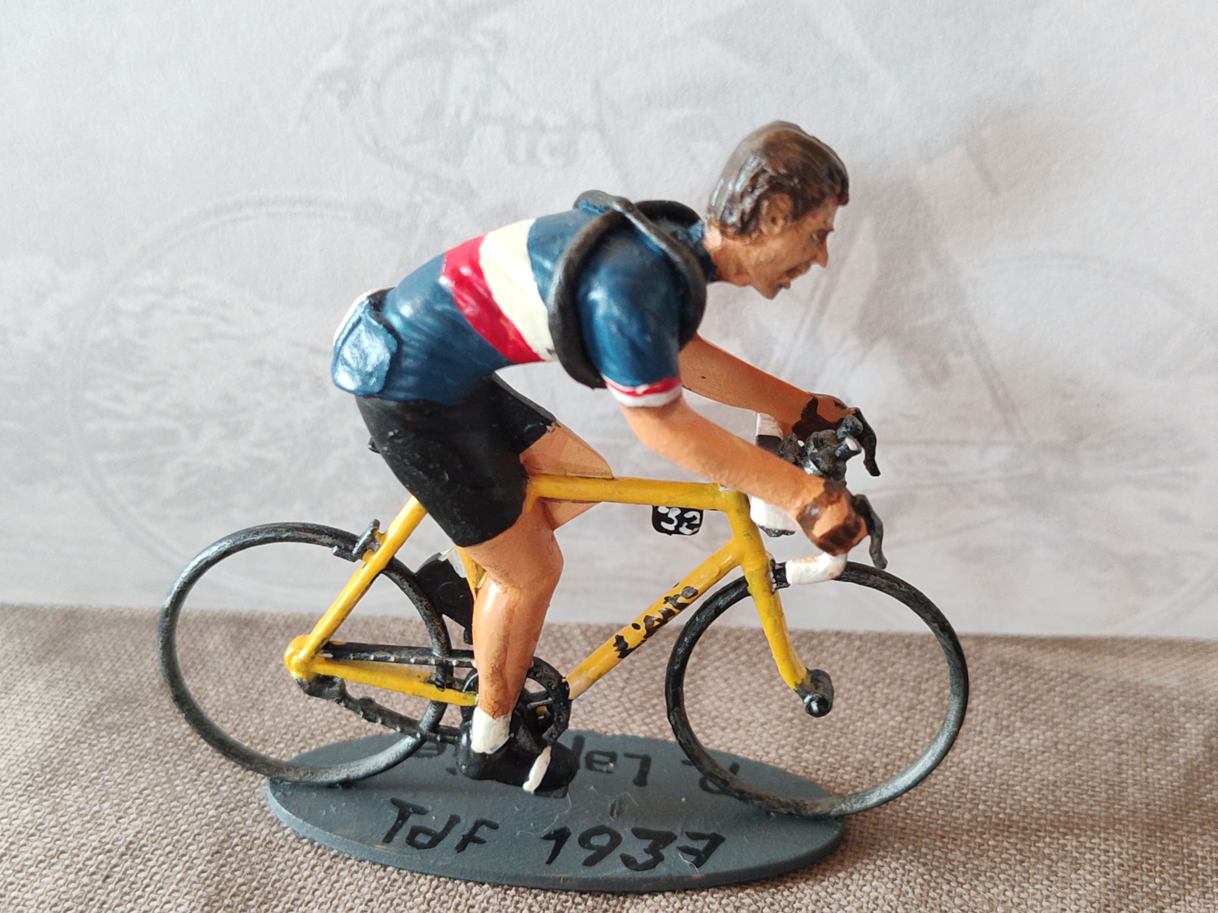 Miniature cyclist on a base marked Tour de France 1937