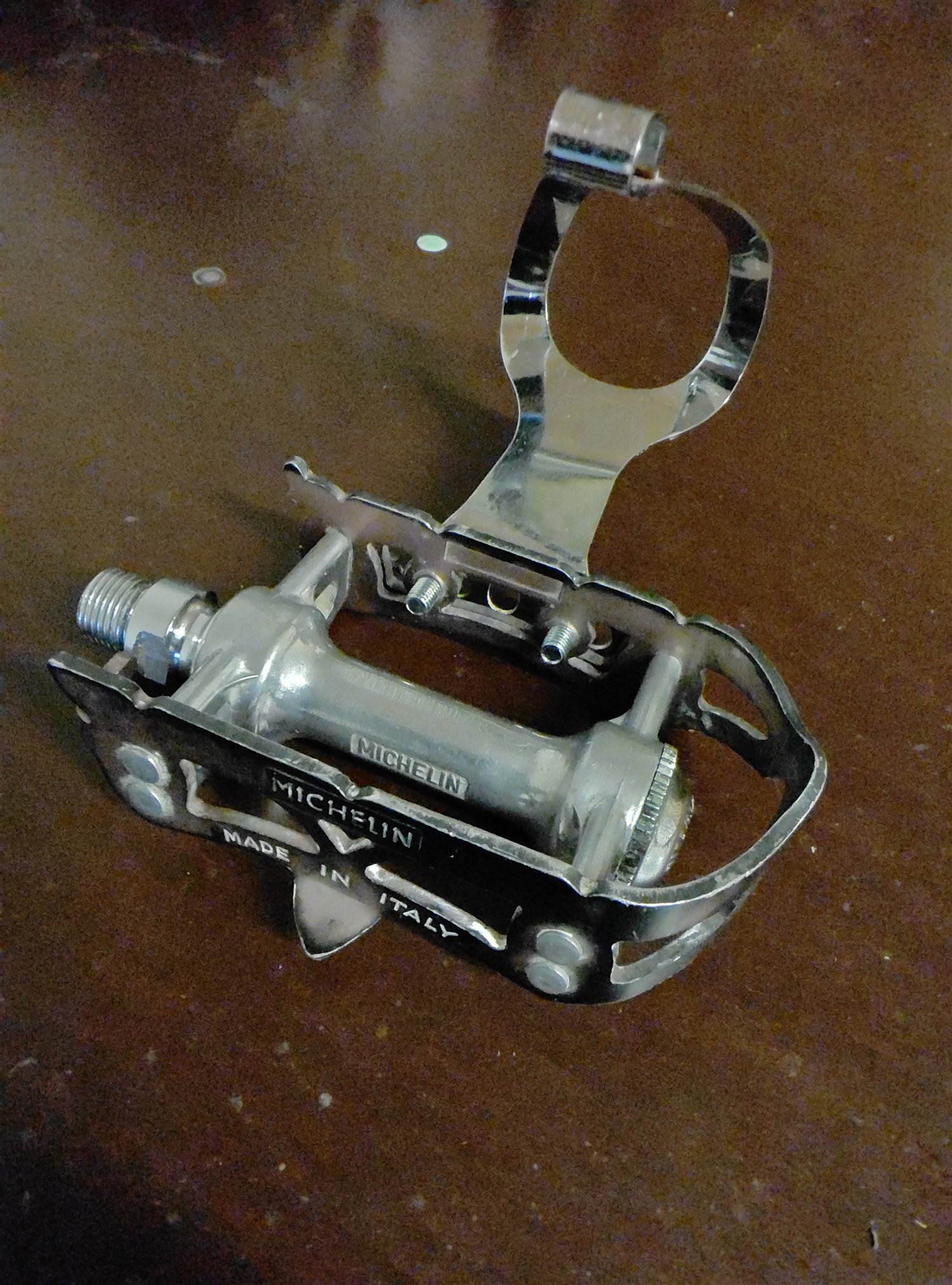Italian racing bicycle pedal from the collection with MICHELIN stamped on its body and plate